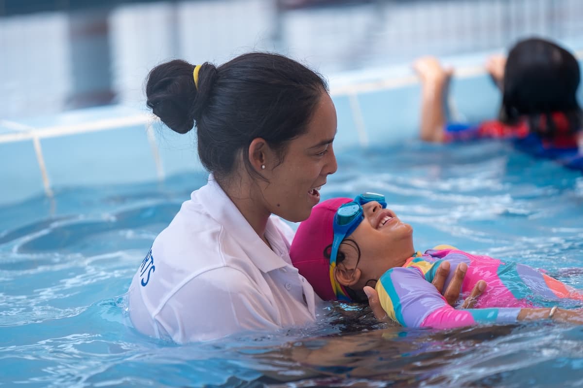 Children learning to swim