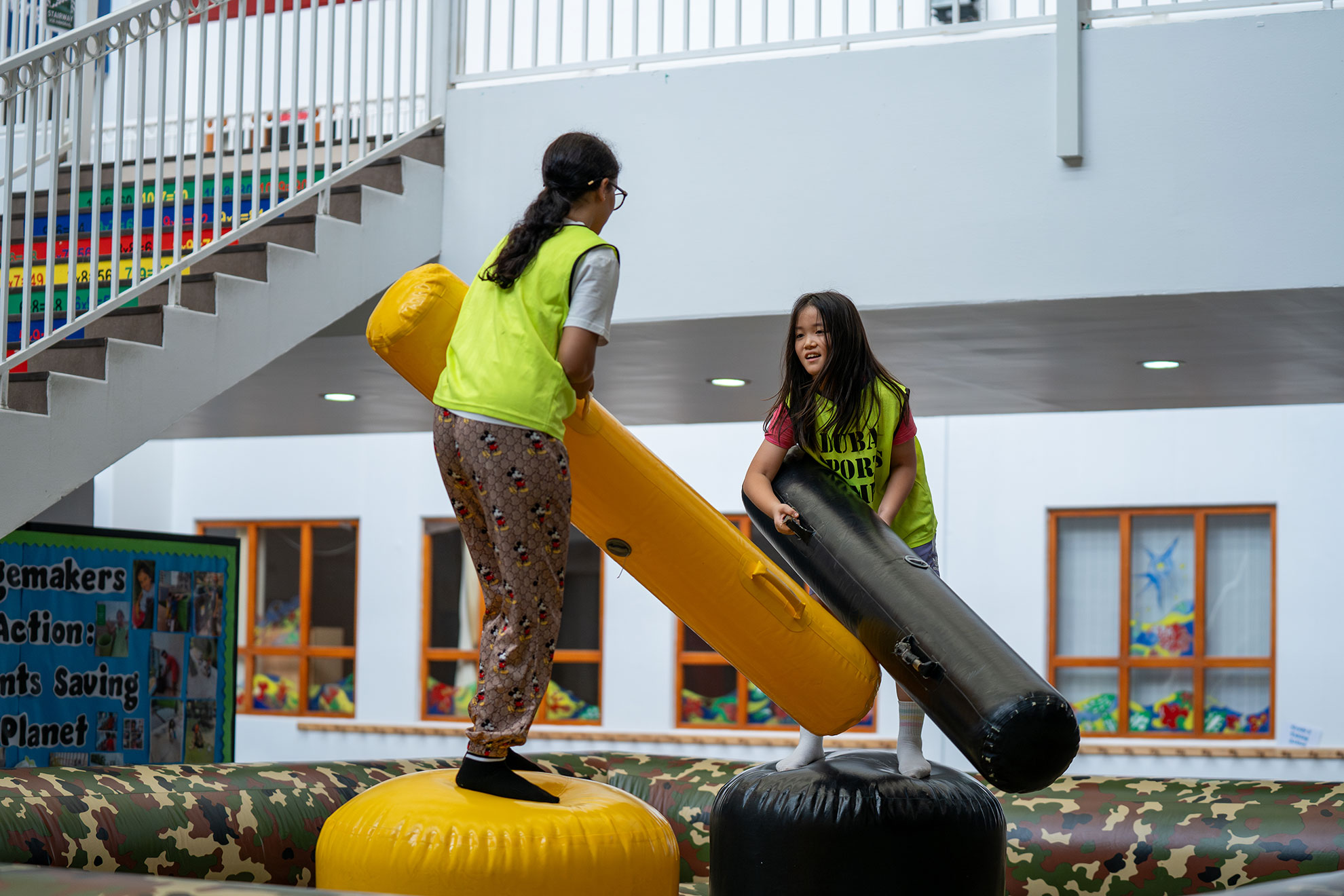 Kids collaborating and building teamwork skills through fun challenges